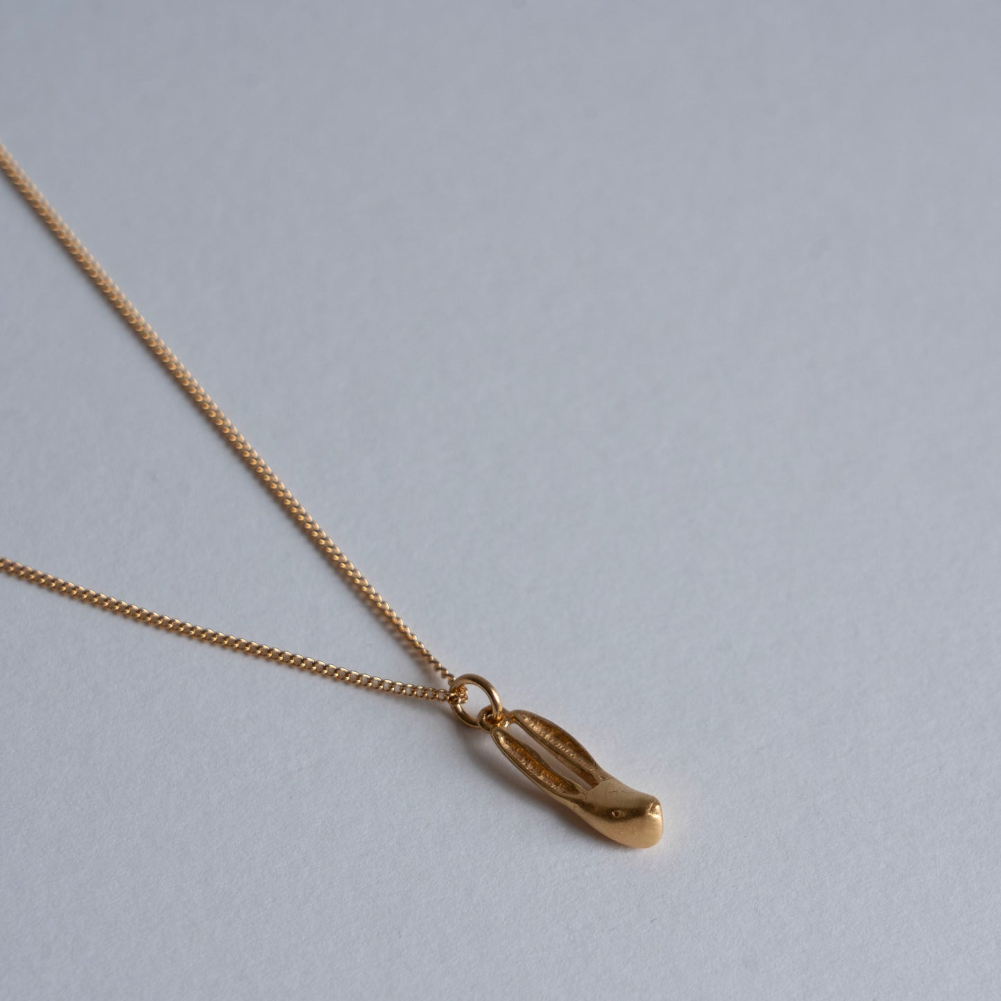 Gold hare necklace