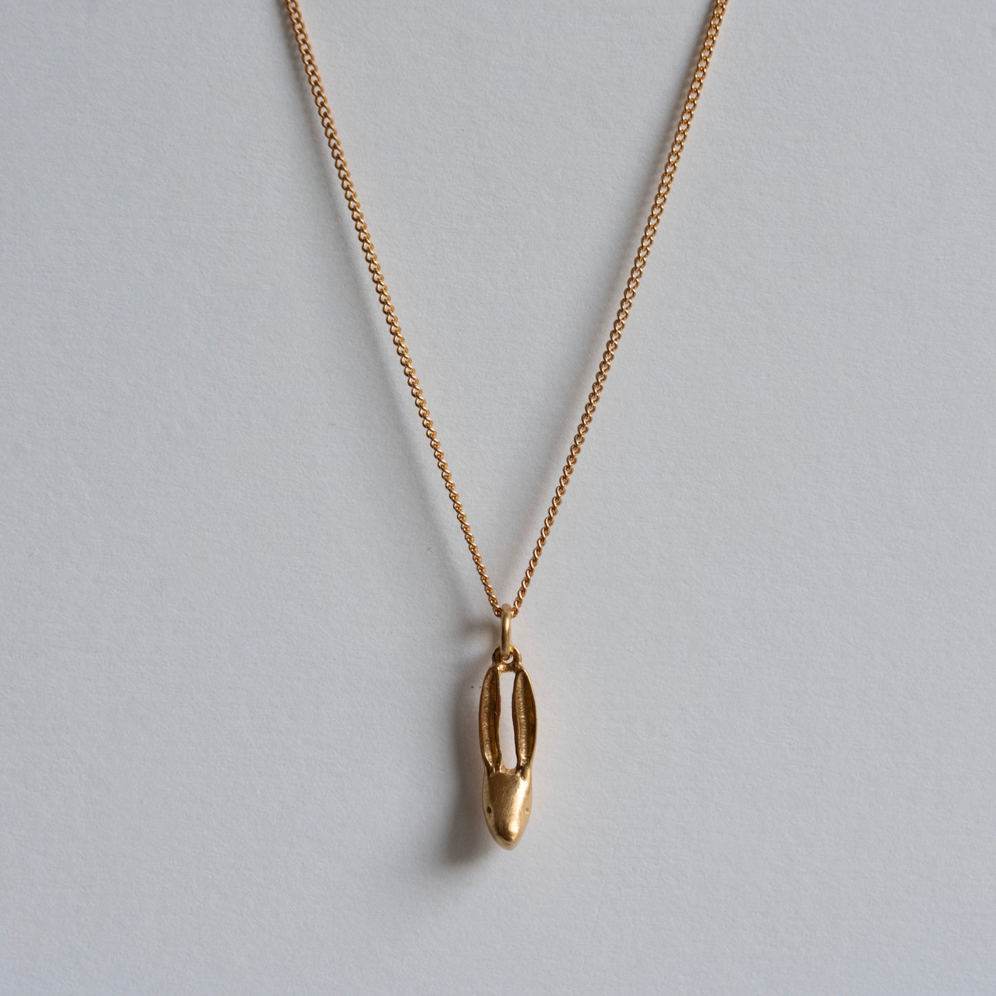Gold hare necklace