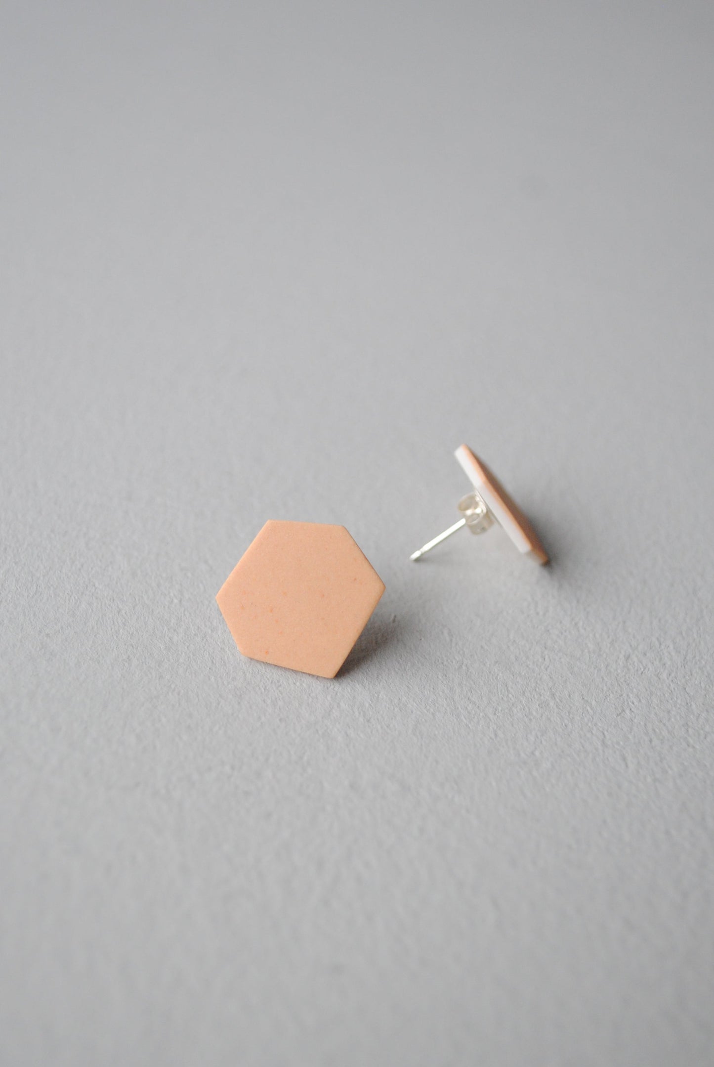 Peach hexagon stud earrings