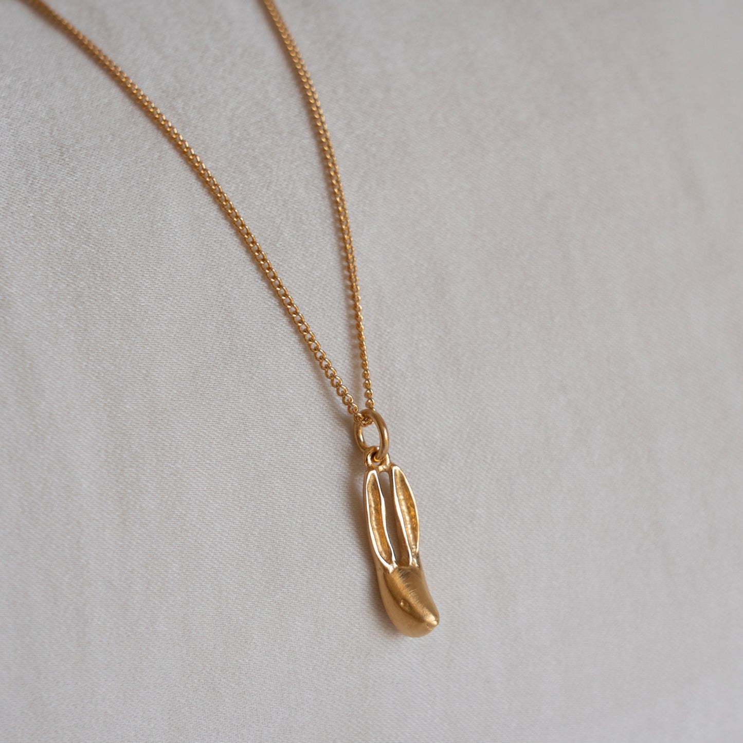 Gold hare necklace