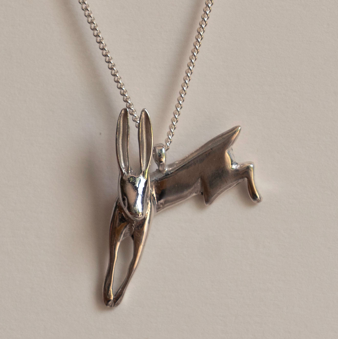 Silver leaping hare necklace