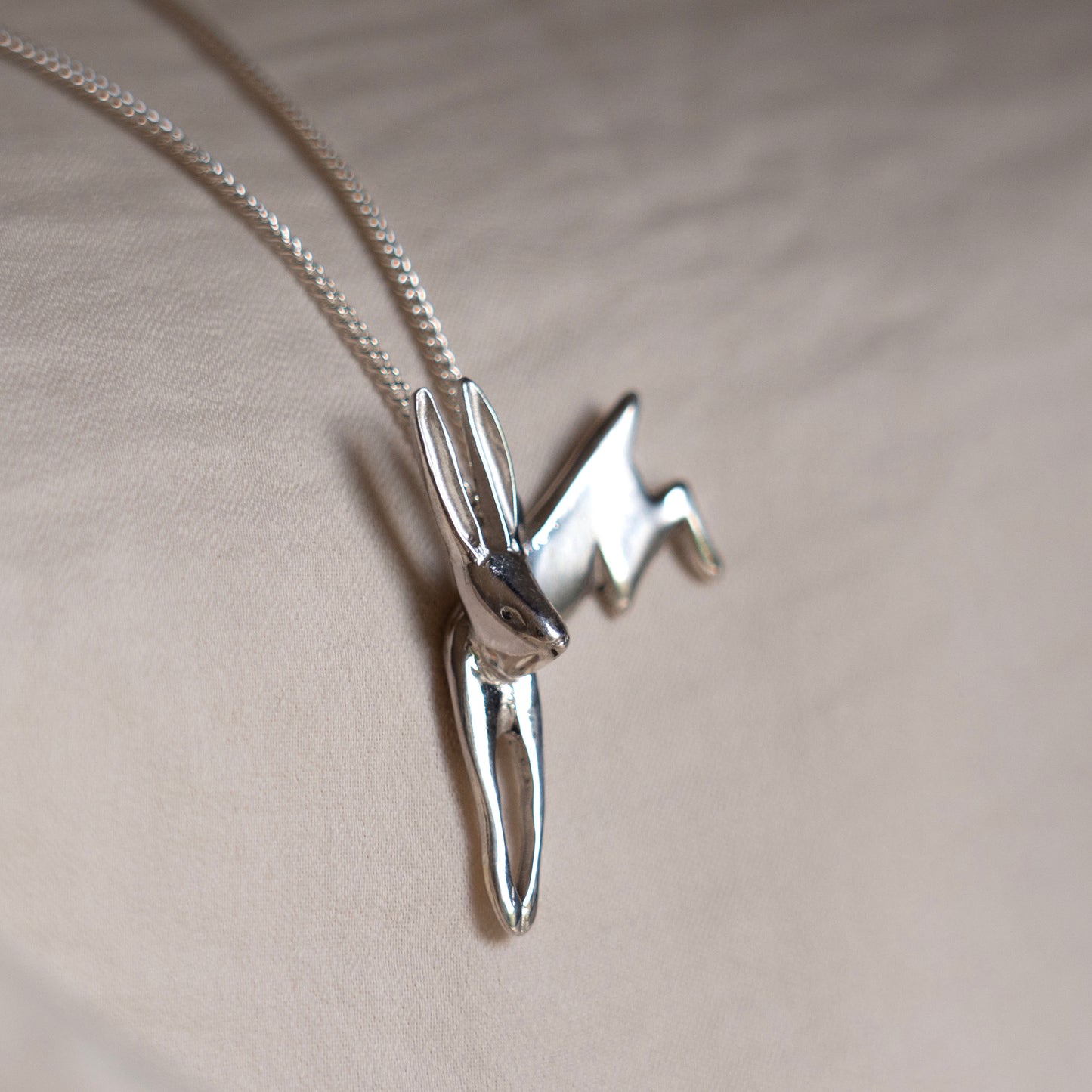 Silver leaping hare necklace