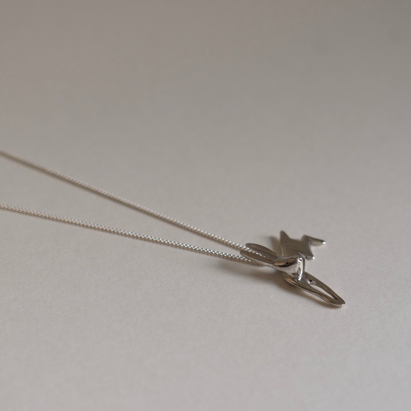 Silver leaping hare necklace