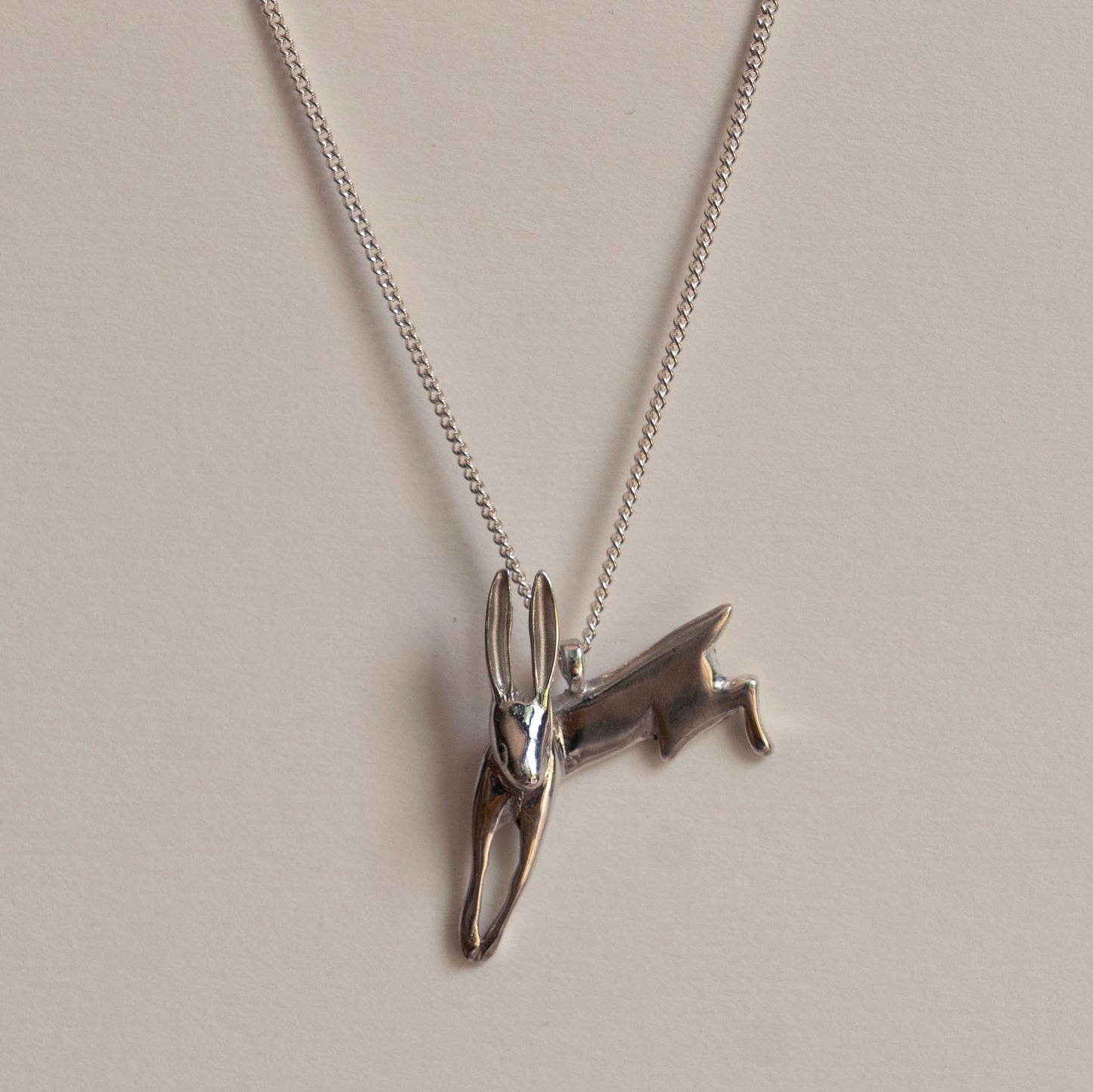 Silver leaping hare necklace