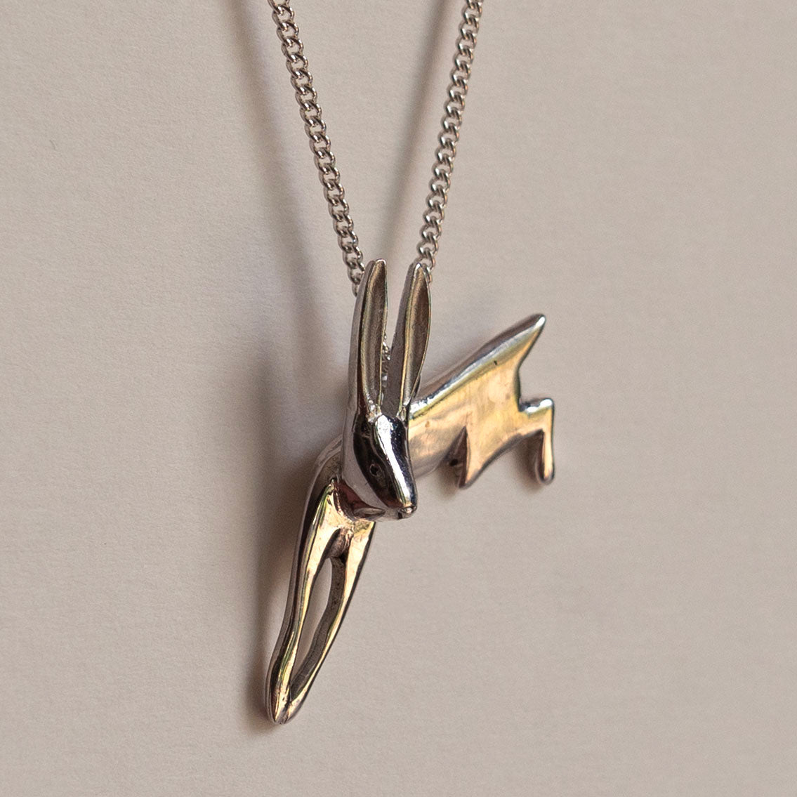 Silver leaping hare necklace