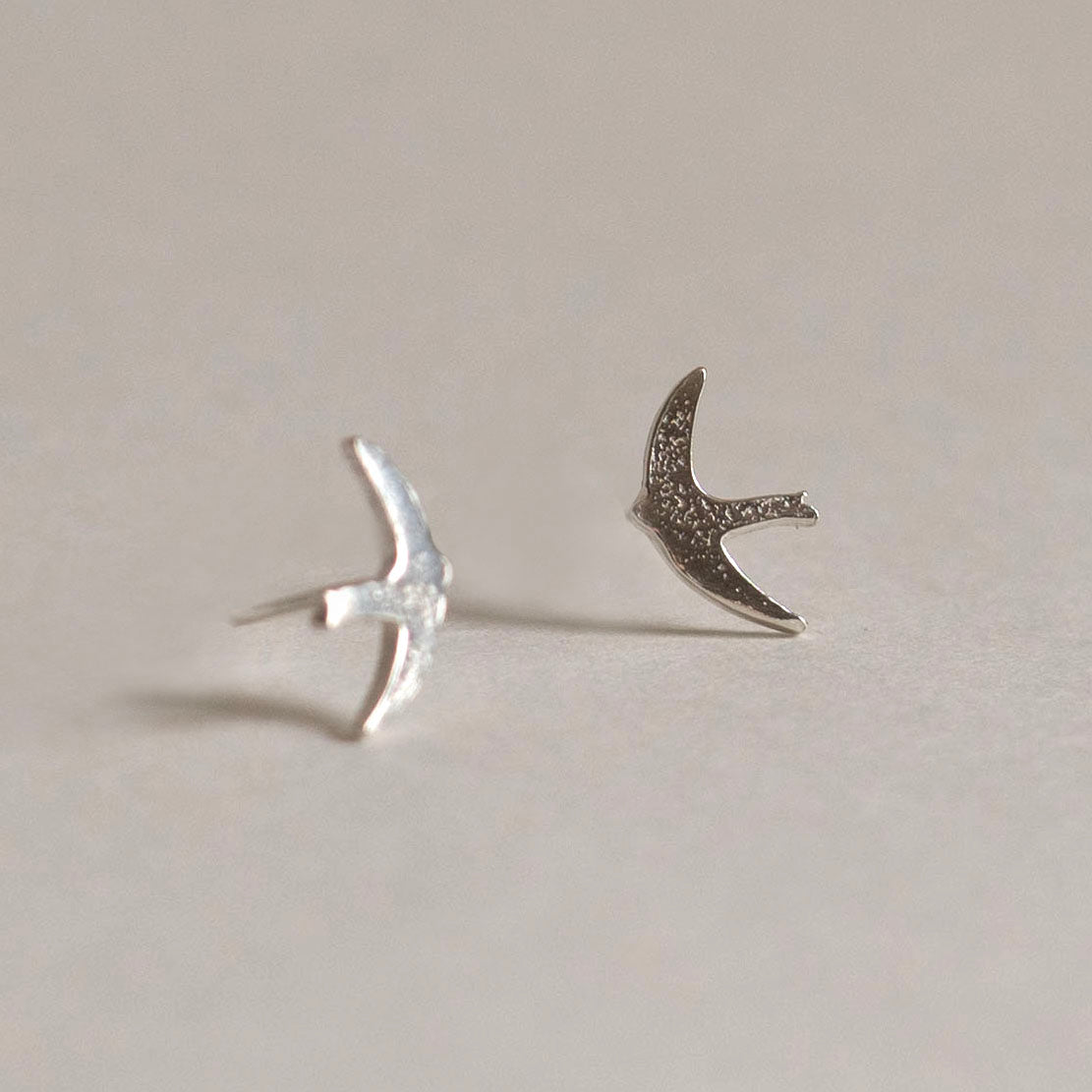 Silver swift stud earrings