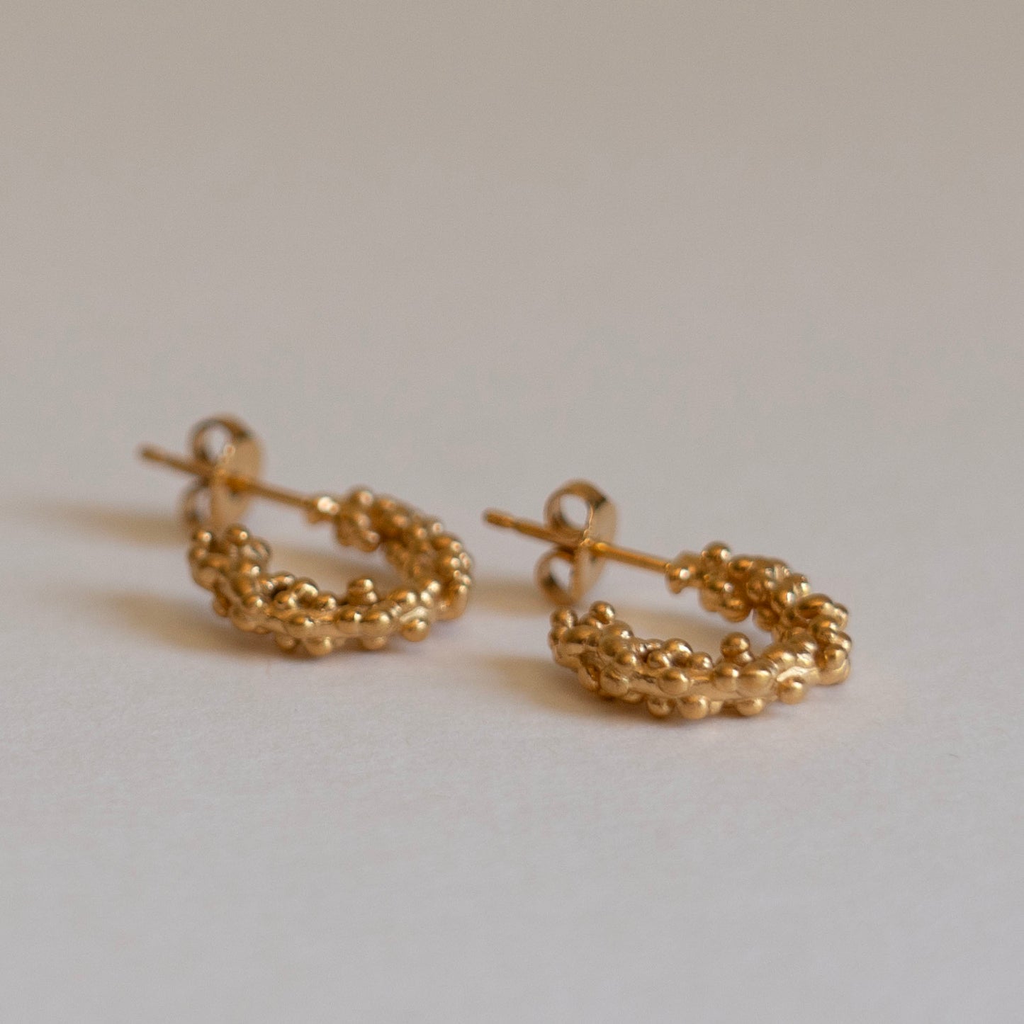 Gold millet seed hoop earrings