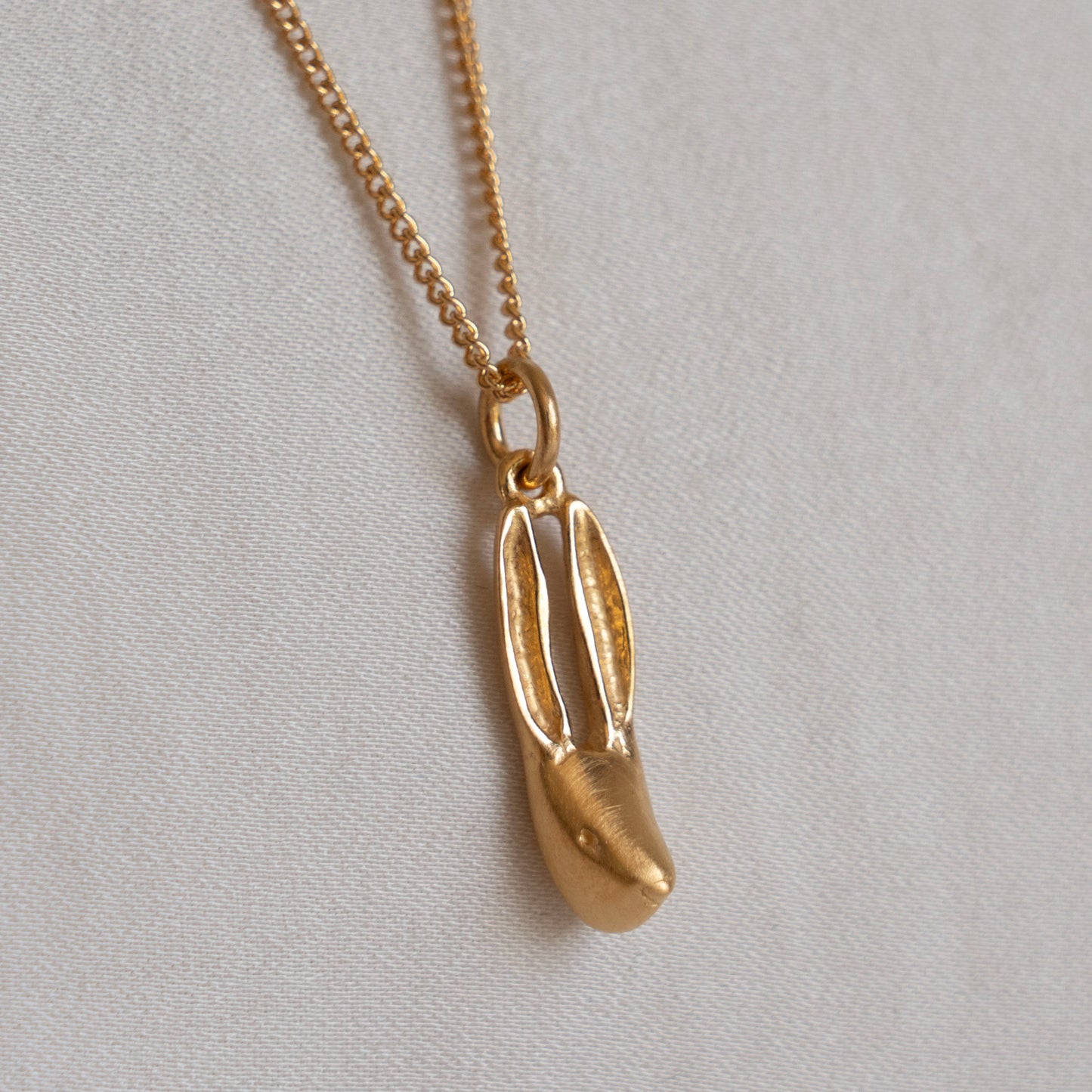 Gold hare necklace