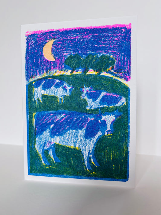 'Cows in a Field at Night' greetings card