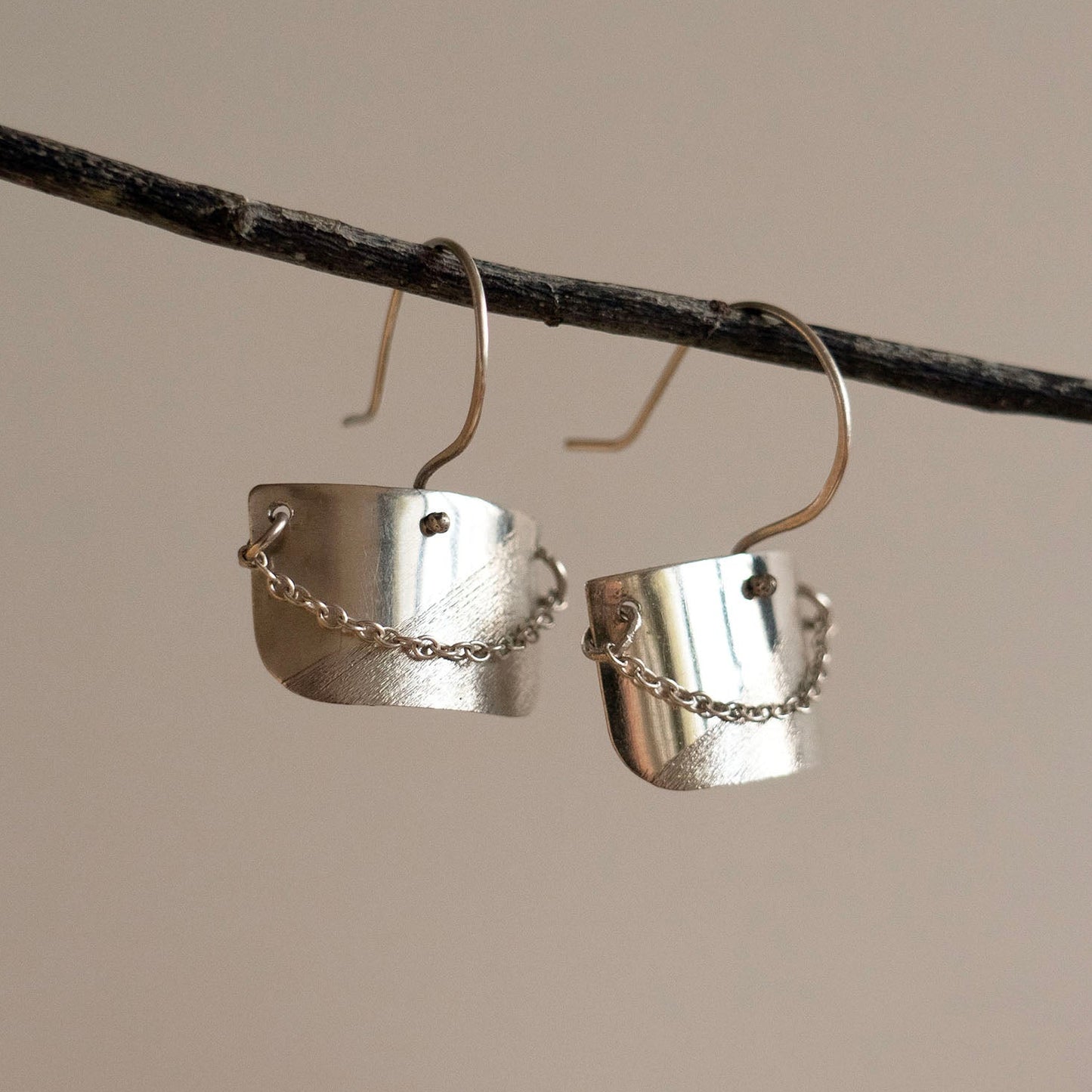 Shield and chain drop earrings