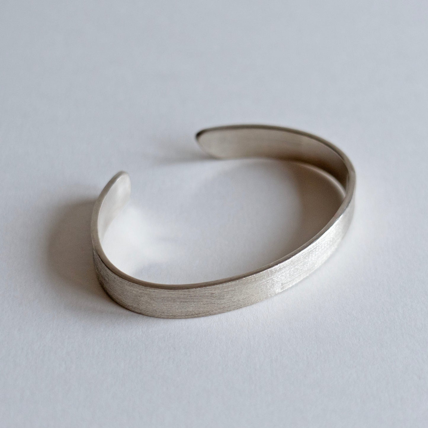 Wide brushed solid silver cuff