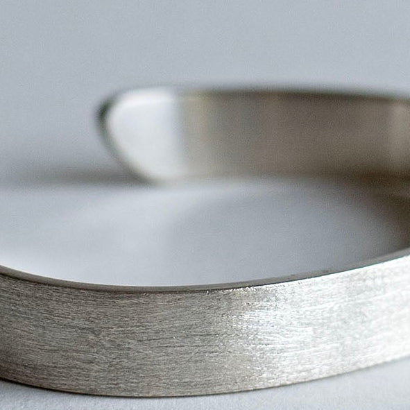 Wide brushed solid silver cuff