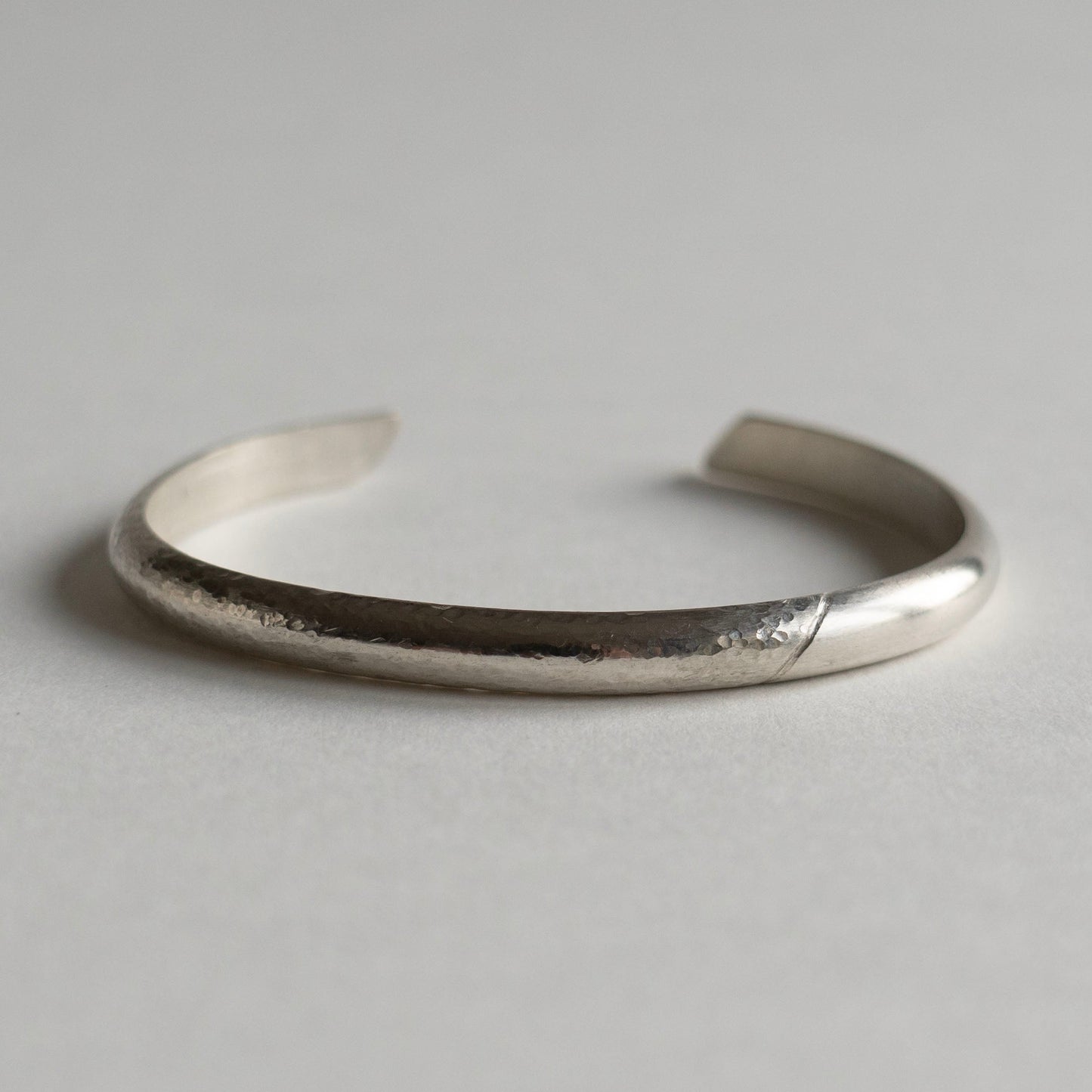 Asymmetrical cuff