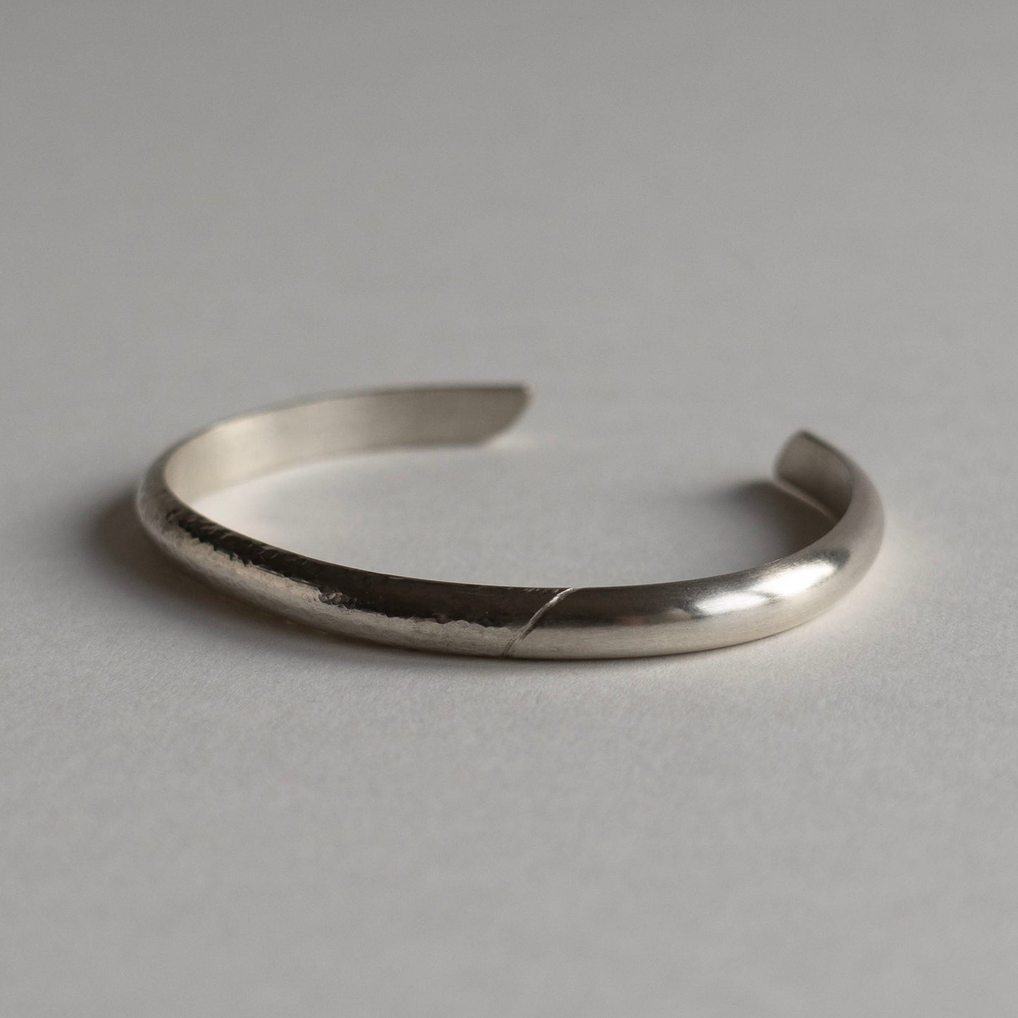 Asymmetrical cuff
