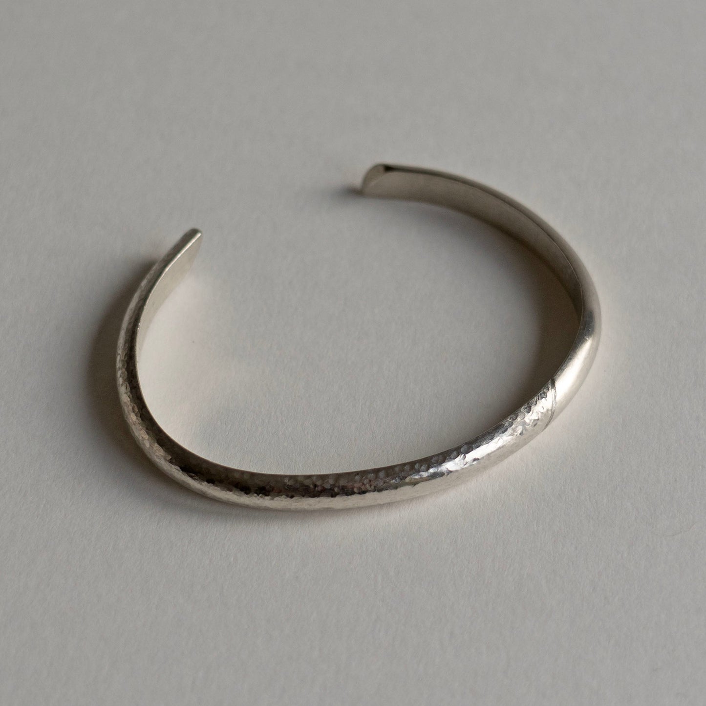 Asymmetrical cuff