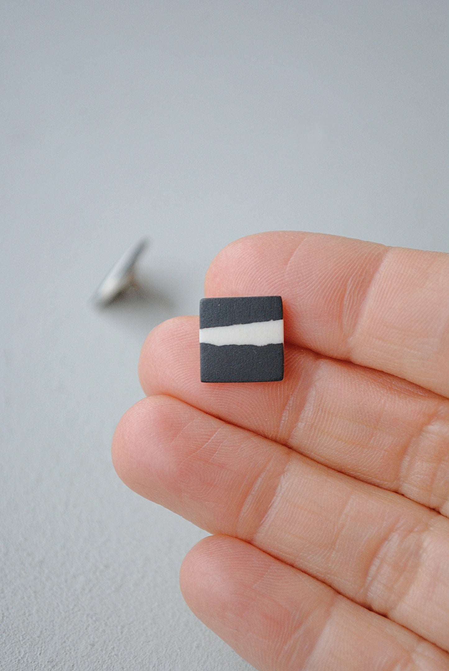Black and white square stud earrings