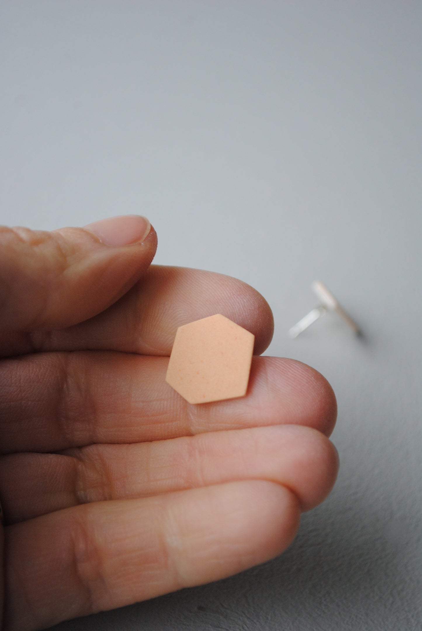 Peach hexagon stud earrings