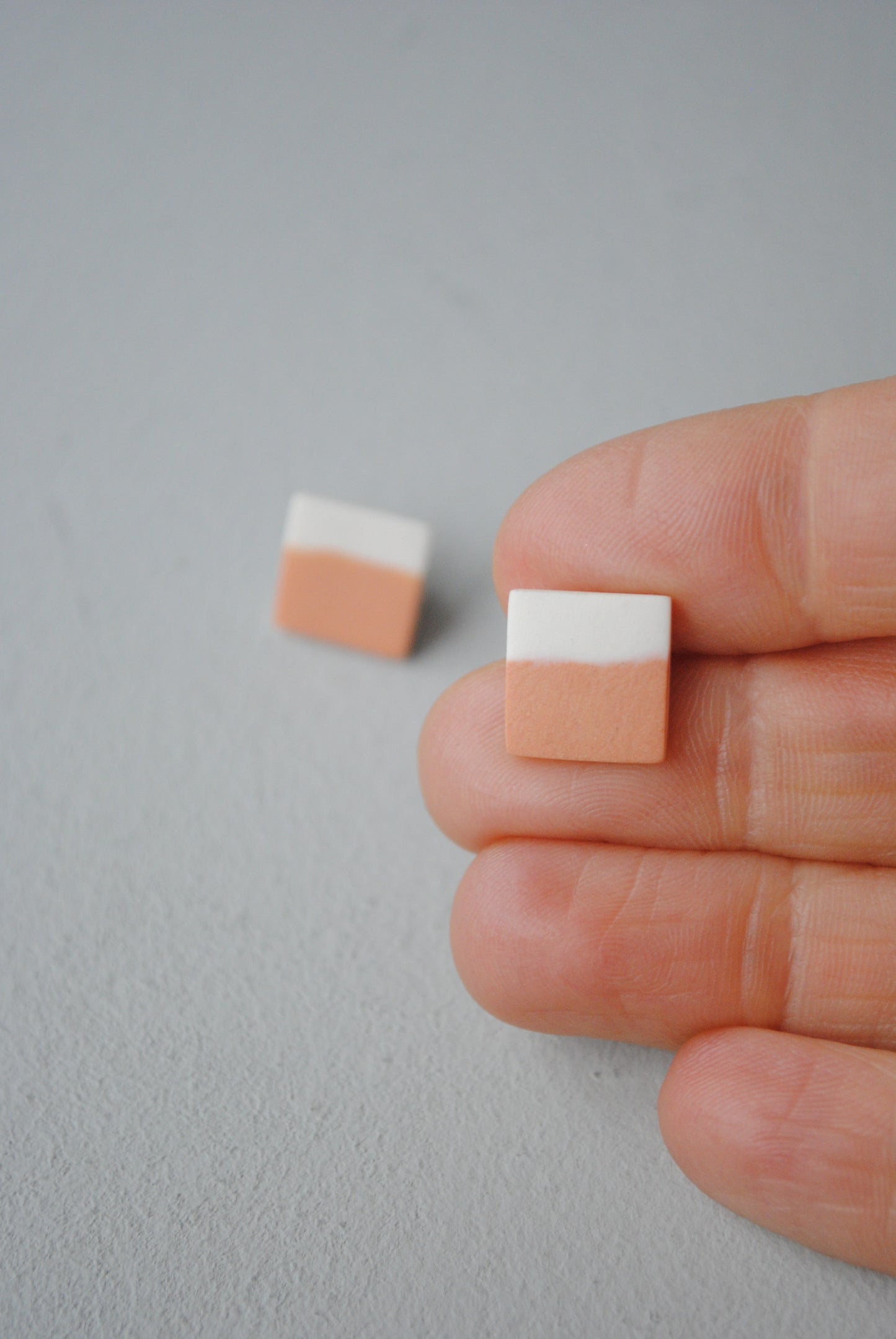 Peach and white square stud earrings