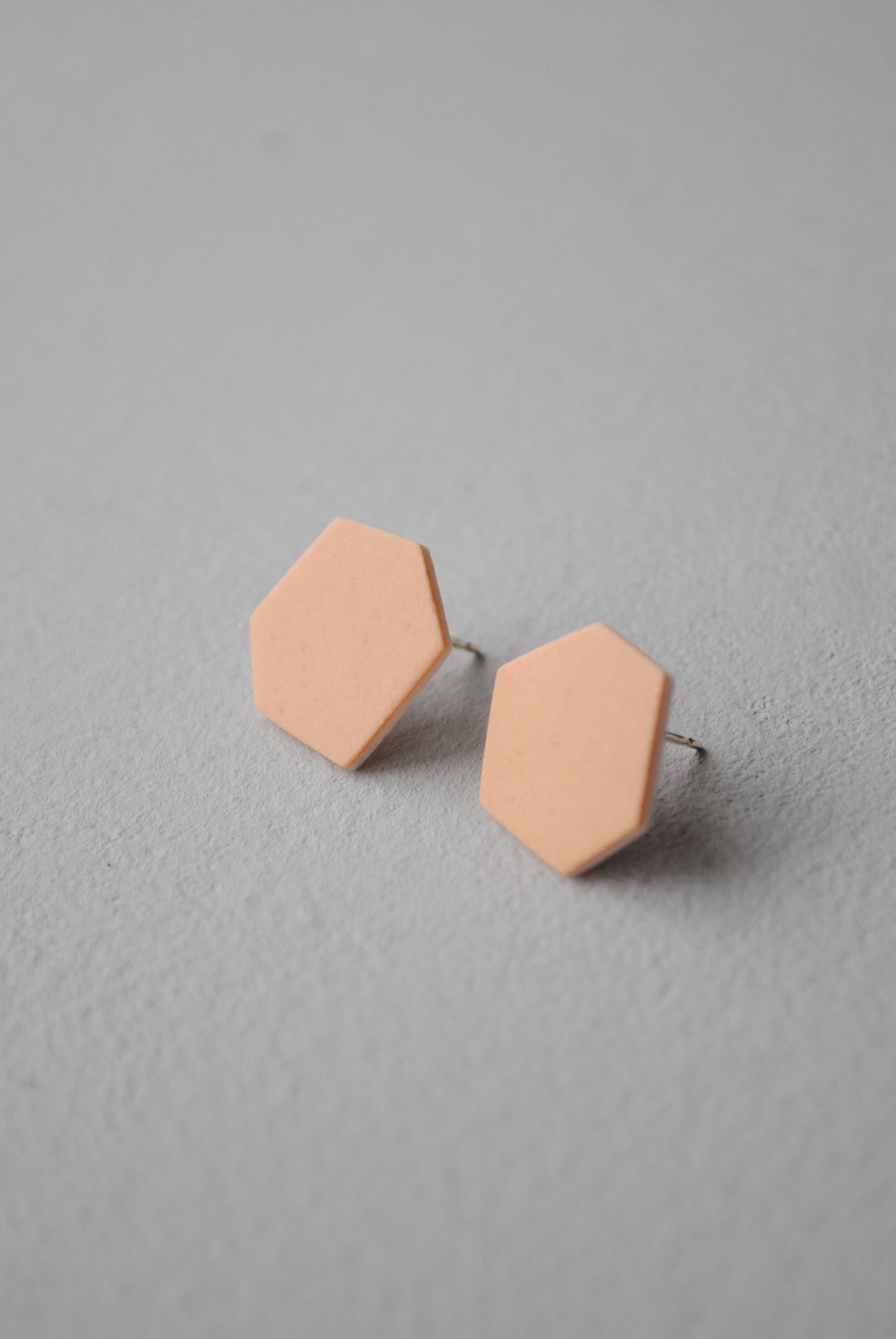 Peach hexagon stud earrings