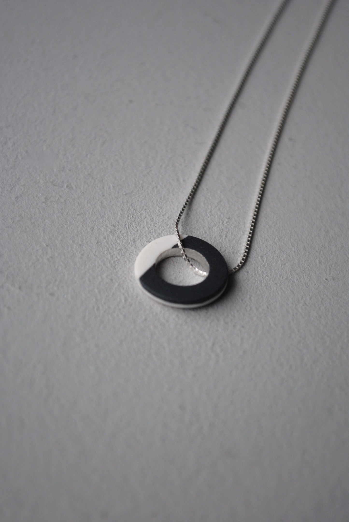 Black and white full circle necklace