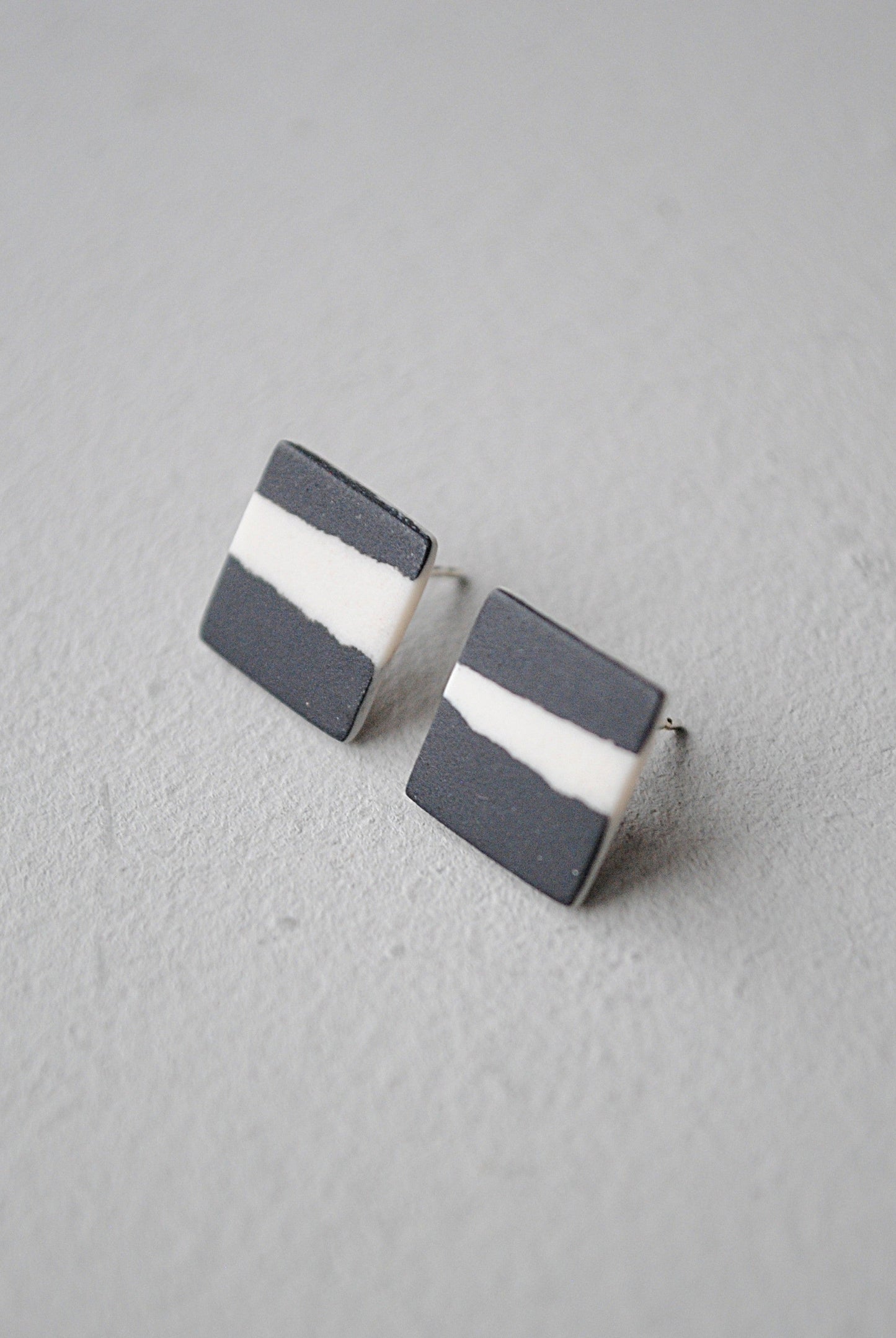 Black and white square stud earrings