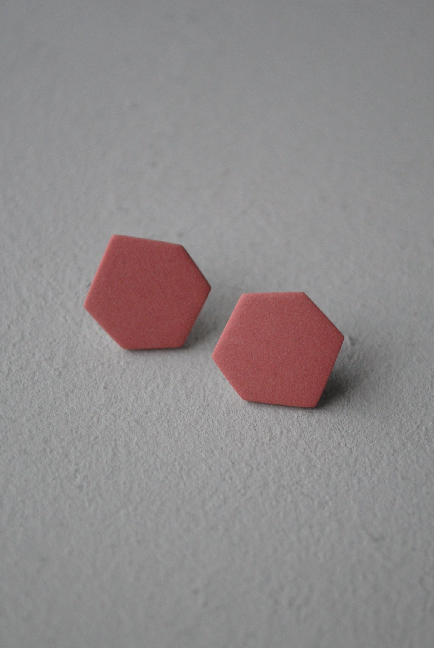 Deep orange hexagon earrings