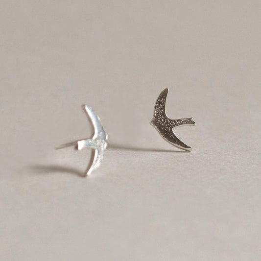 Silver swift stud earrings