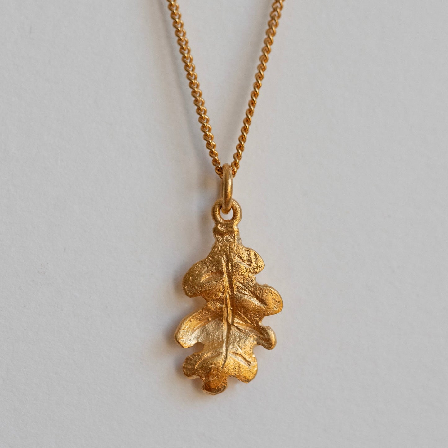 Gold oak leaf necklace