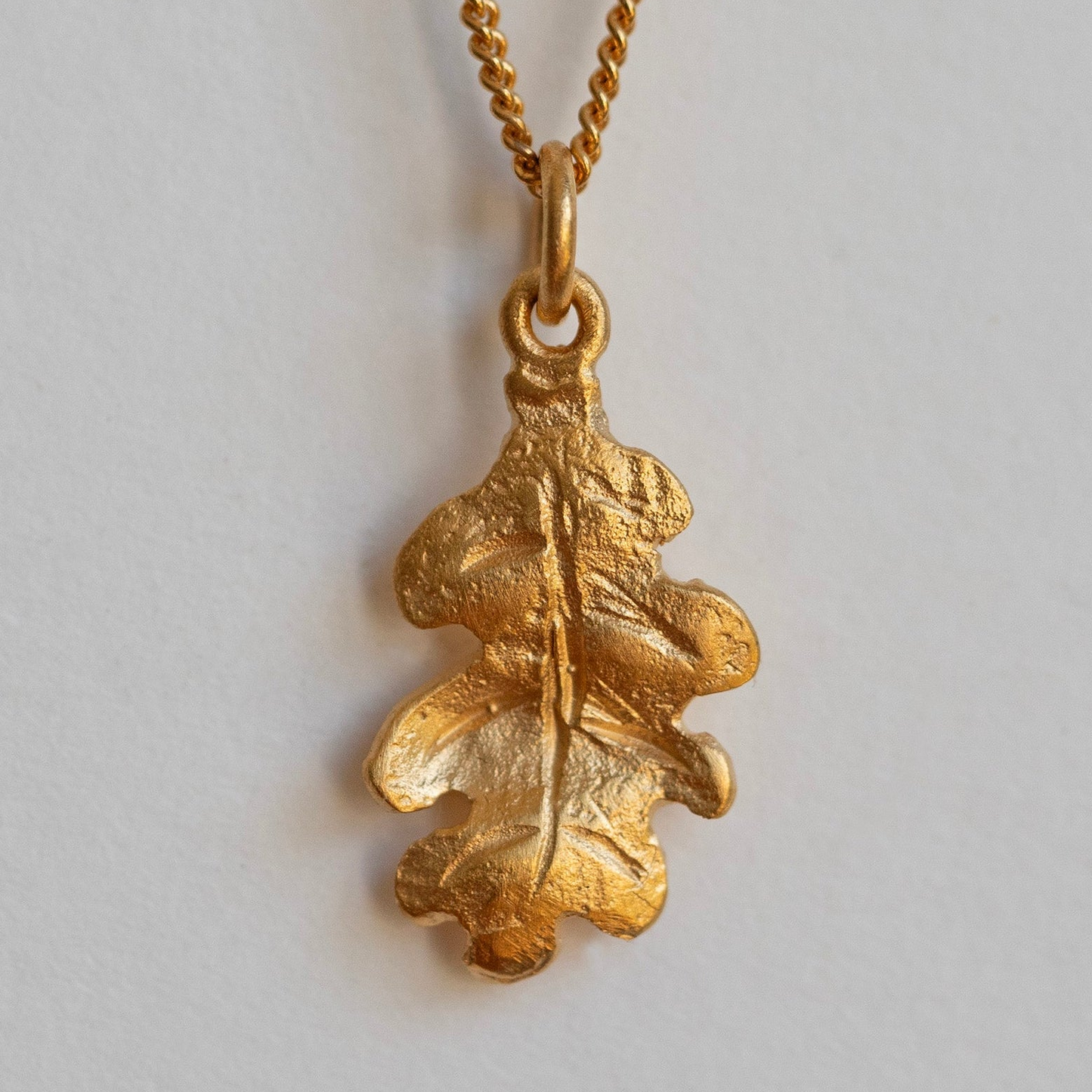 Gold oak leaf necklace