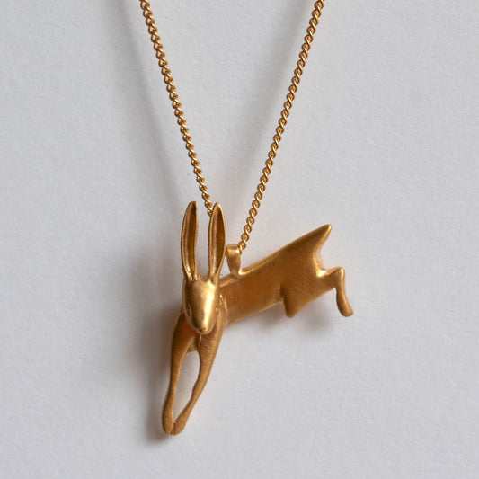 Gold leaping hare necklace