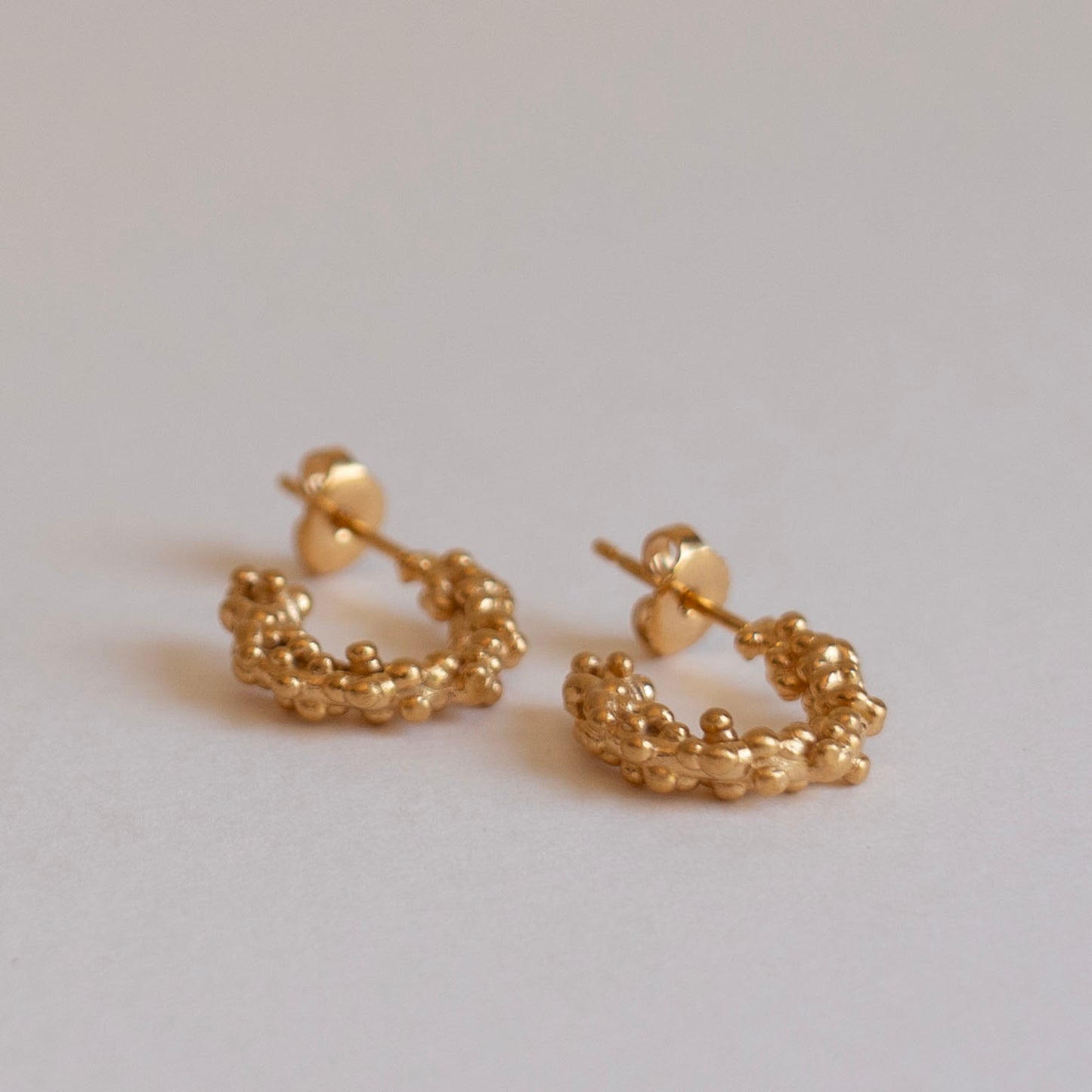 Gold millet seed hoop earrings